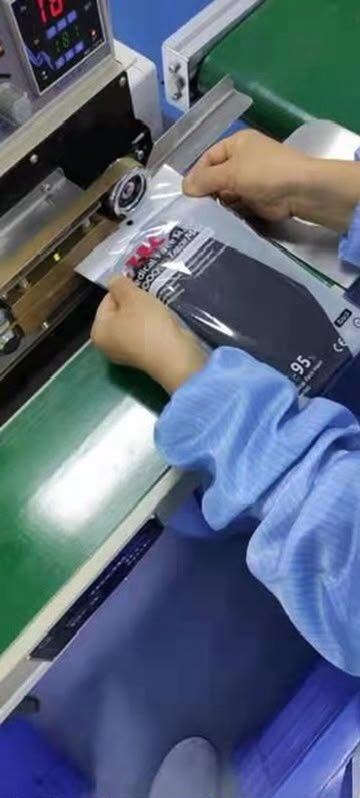 I-TEC staff hand-checking packaged medical products